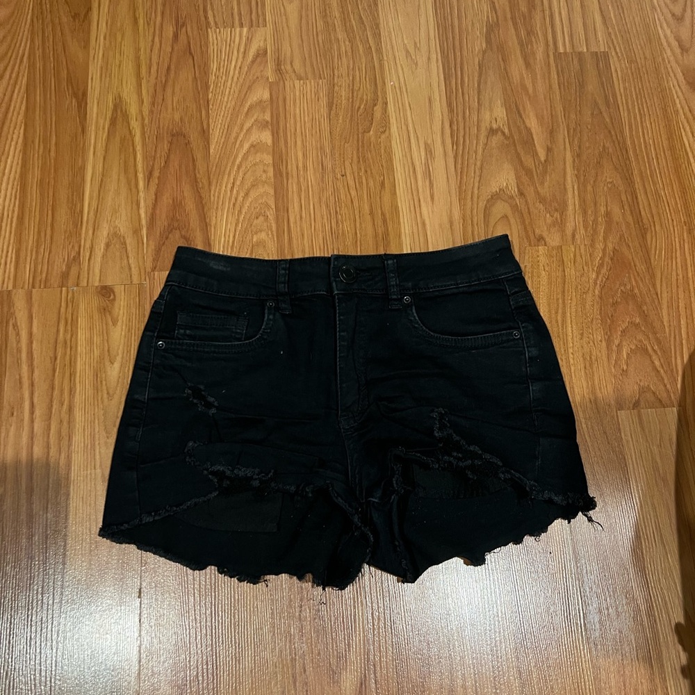 Ripped black shorts